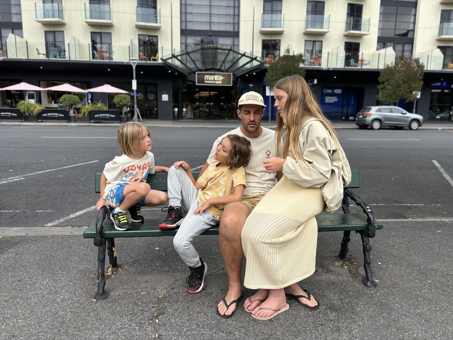The Parkes family together on a bench during their Channel 9 Today feature